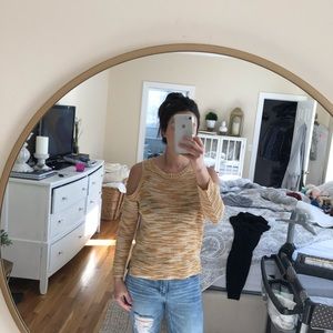 Knitted sweater top with cut outs